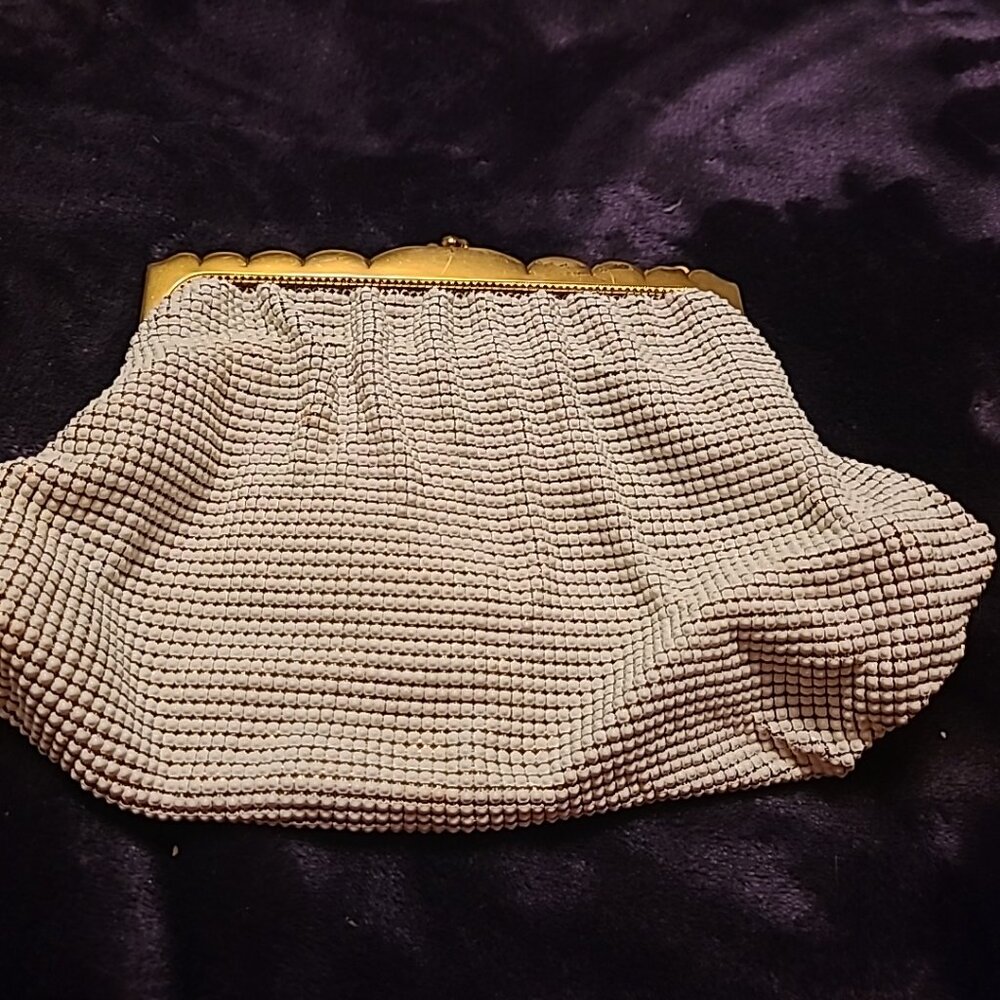 White and gold clutch